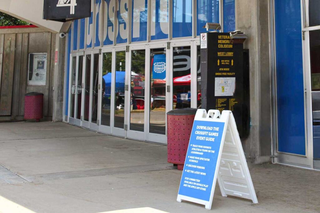 CrossFit Games Signage 2 A-Frame plastic signage displayed outside the front door of an event center.