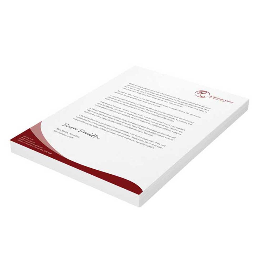 Business Printing 14 Example of a letterhead on a cream sheet of paper with text and a red wave at the bottom of the paper, displayed on a white background.