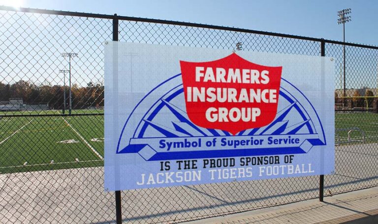 Mesh banner installed on a fench