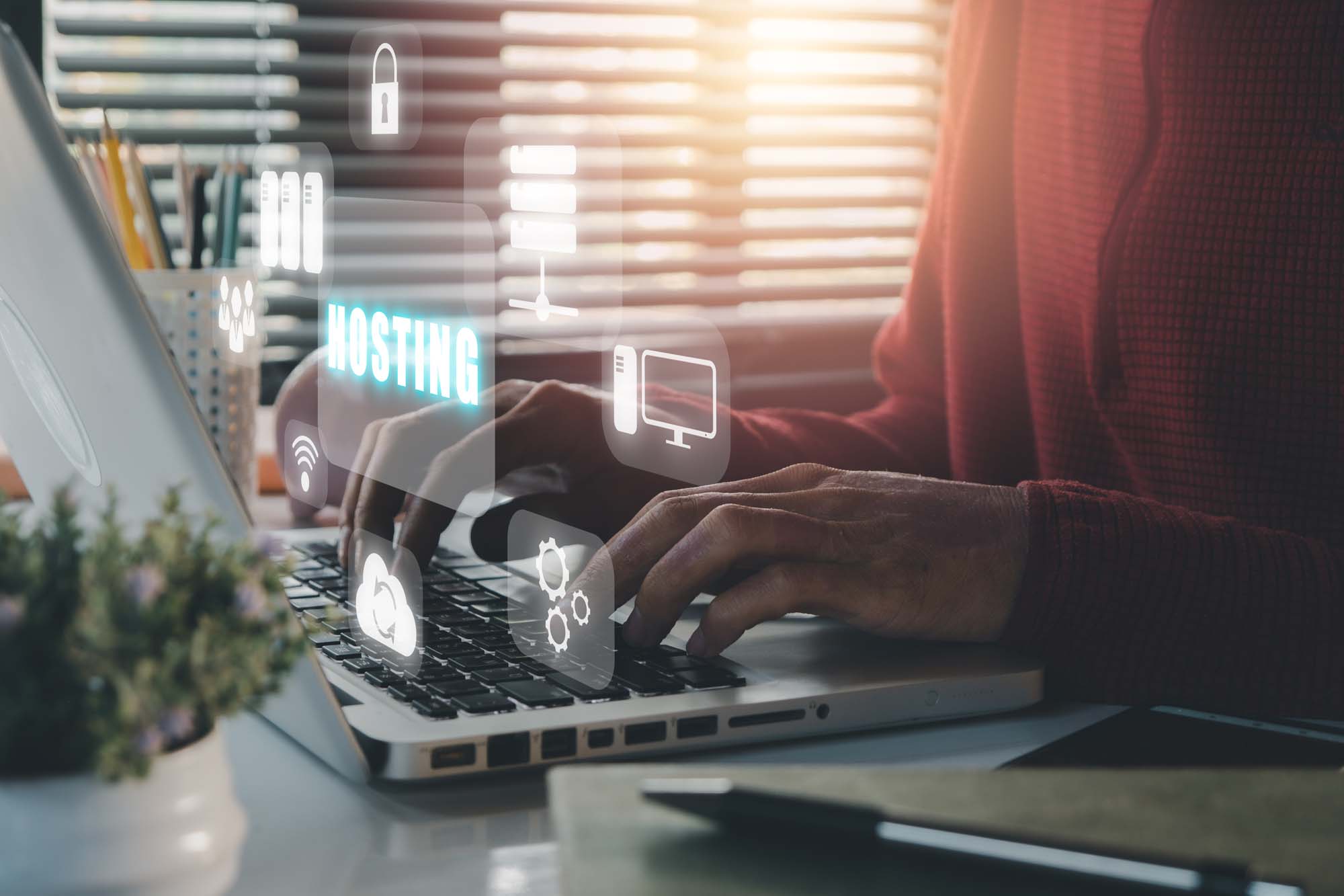 Creative Studio Menu 4 Private Web Hosting concept showing a person working on a laptop with digital hosting icons and secure server technology graphics layered in a home office setting.