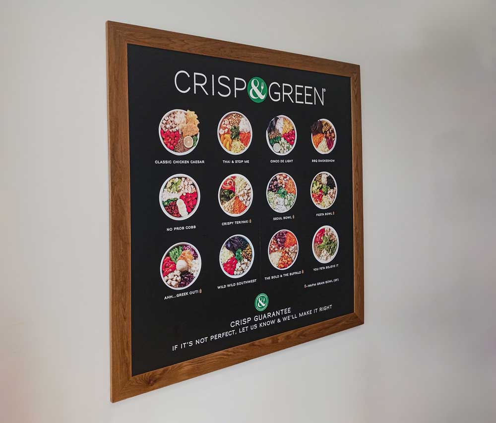 Menu board for "Crisp & Green" restaurant.