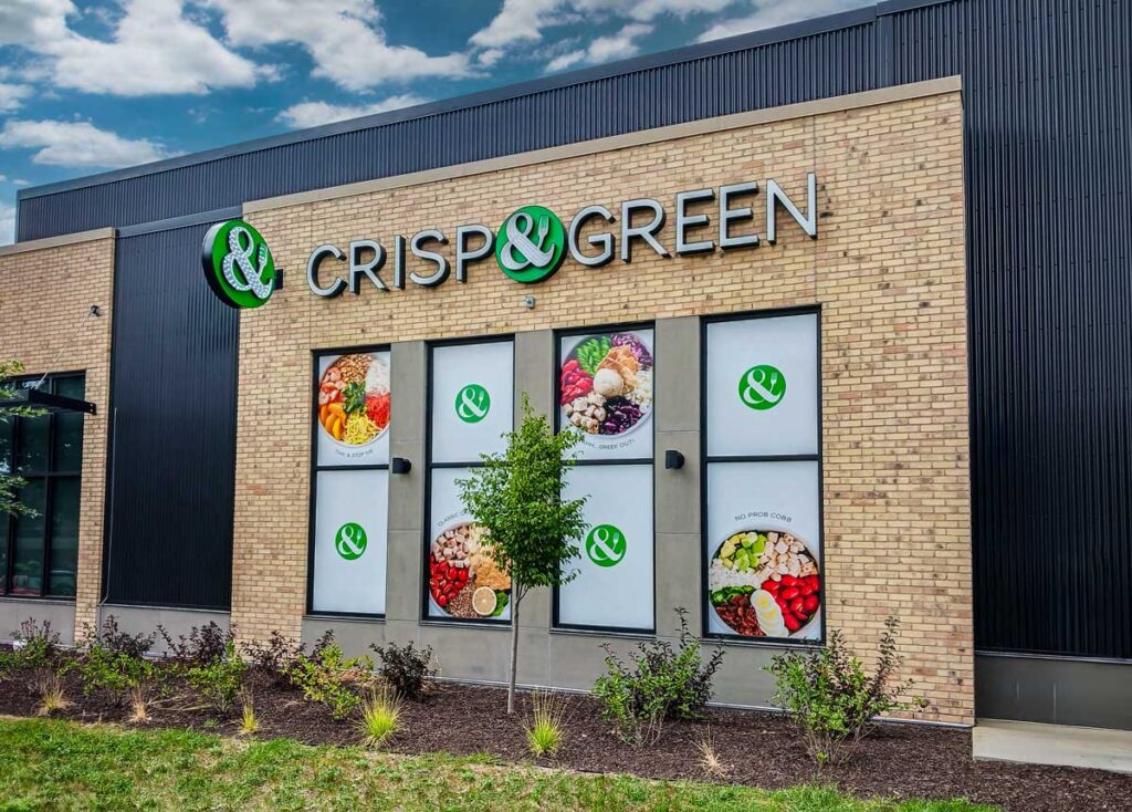 Adhesive Graphics & Films Portfolio 2 Crisp & Green restaurant exterior window signage displaying their logo and images of their food.