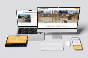 Liberty Remodeling & Construction website displayed on desktop, laptop, tablet, and smartphone showing responsive design and clear home remodeling branding.